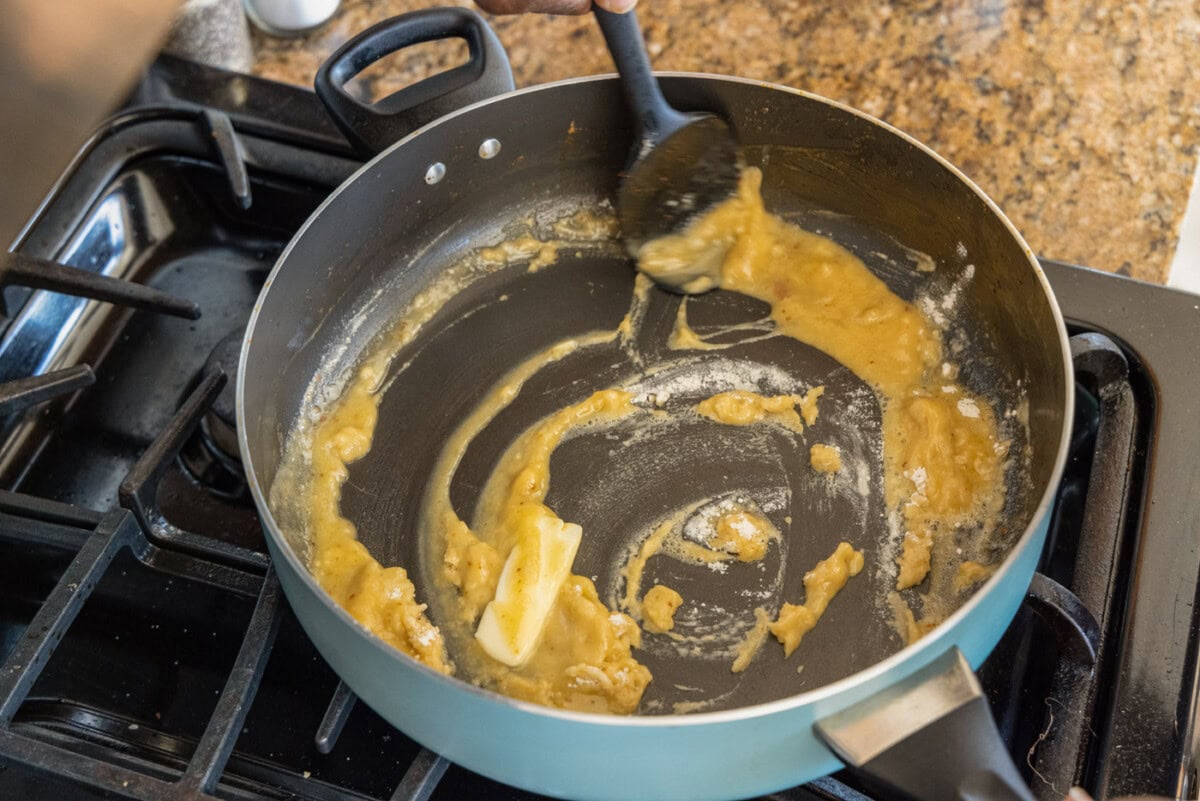spatula stirring roux in skillet