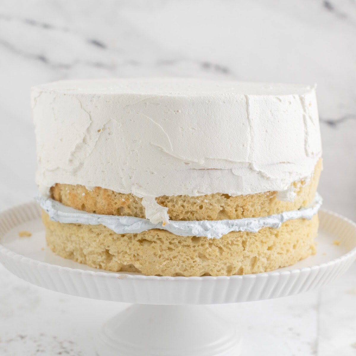frosting a tiered cake
