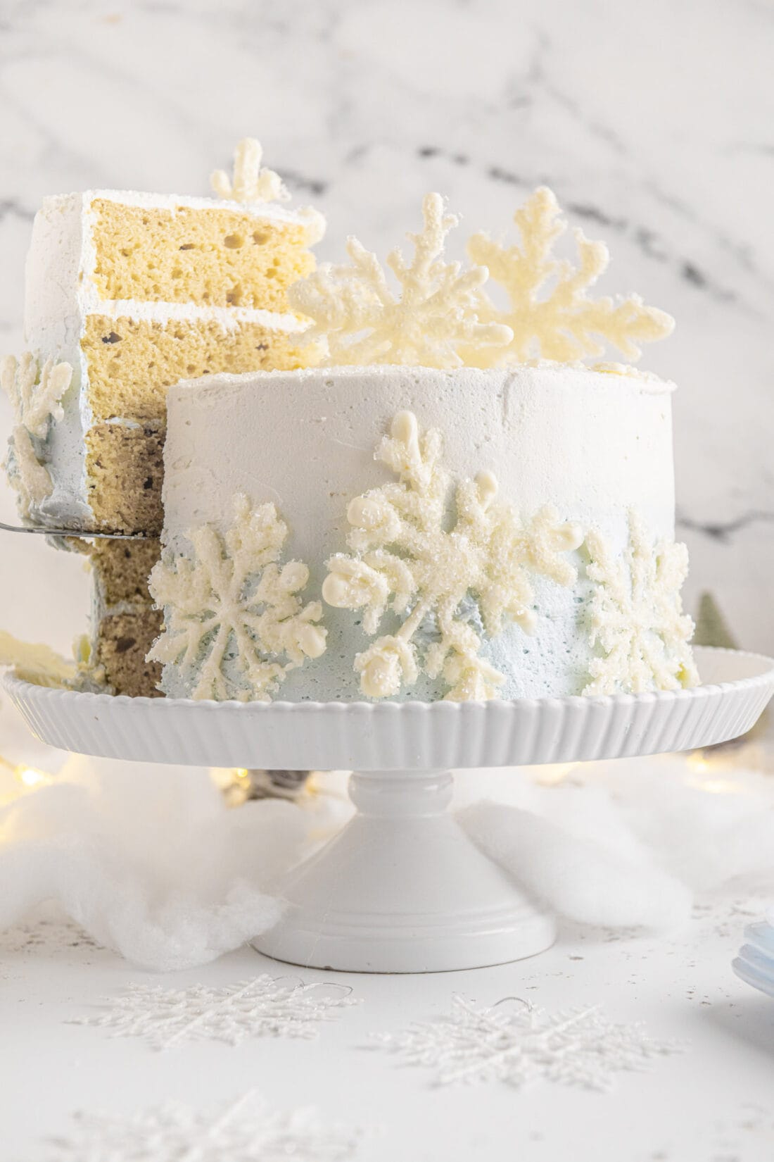 removing a slice of Snowflake Cake