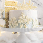 removing a slice of Snowflake Cake