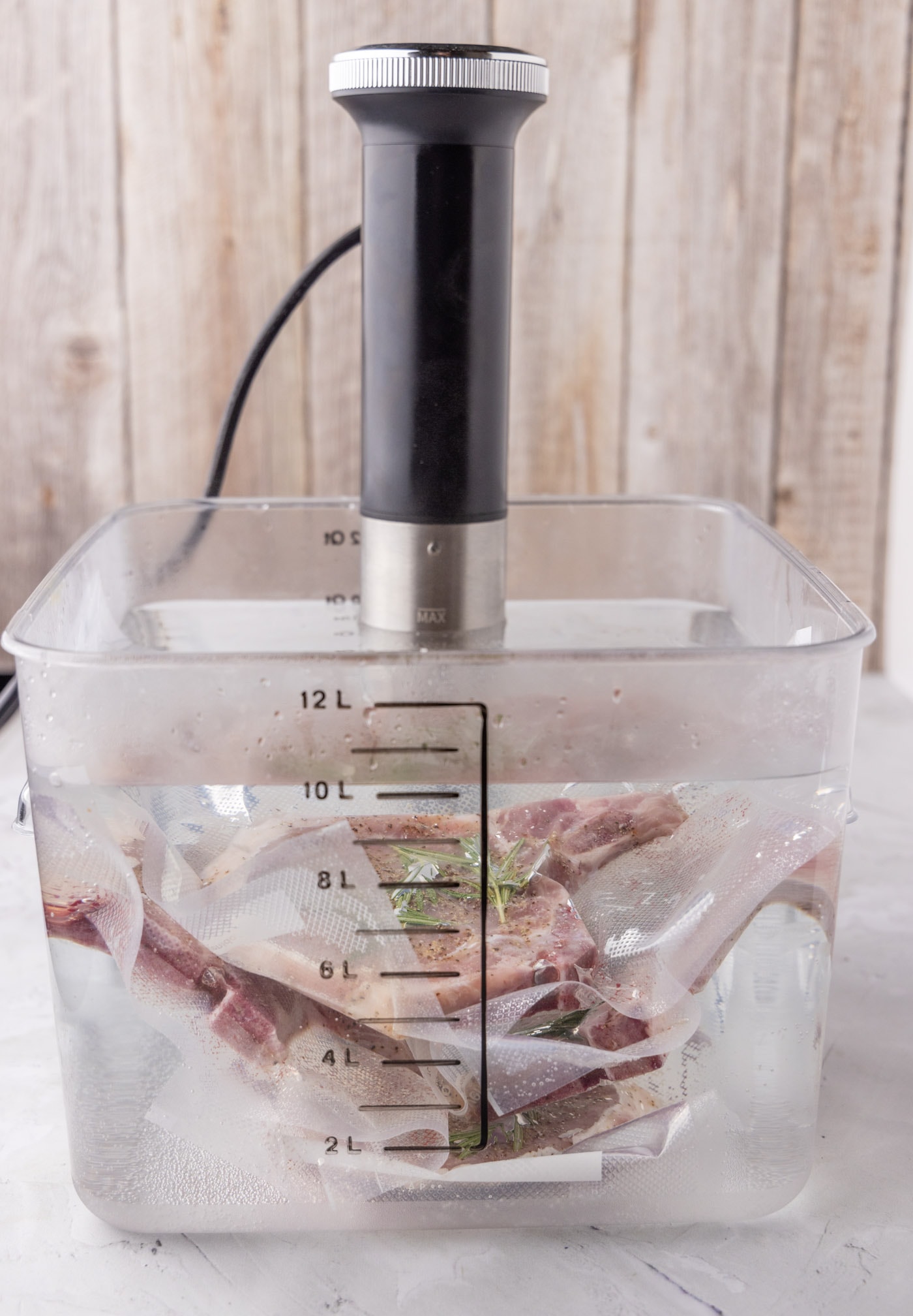 sous vide pork chops in water container