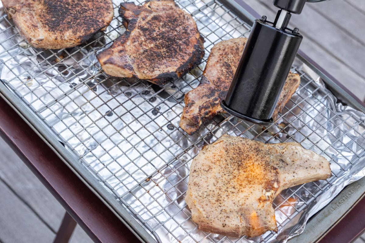 kitchen torch searing pork chops