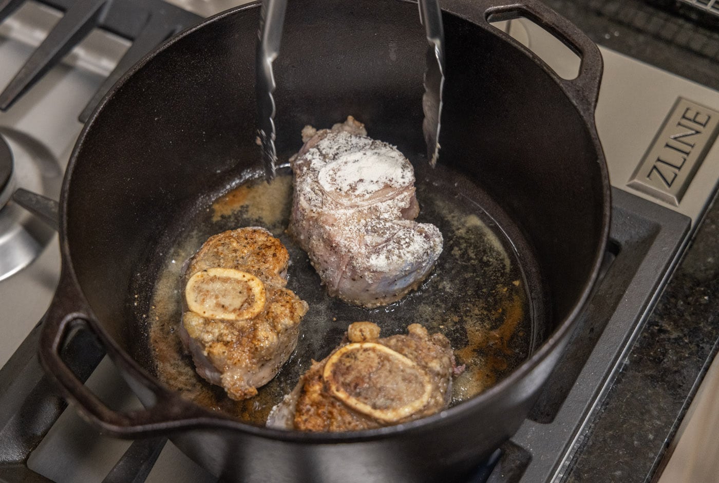 flipping veal shanks in a dutch oven
