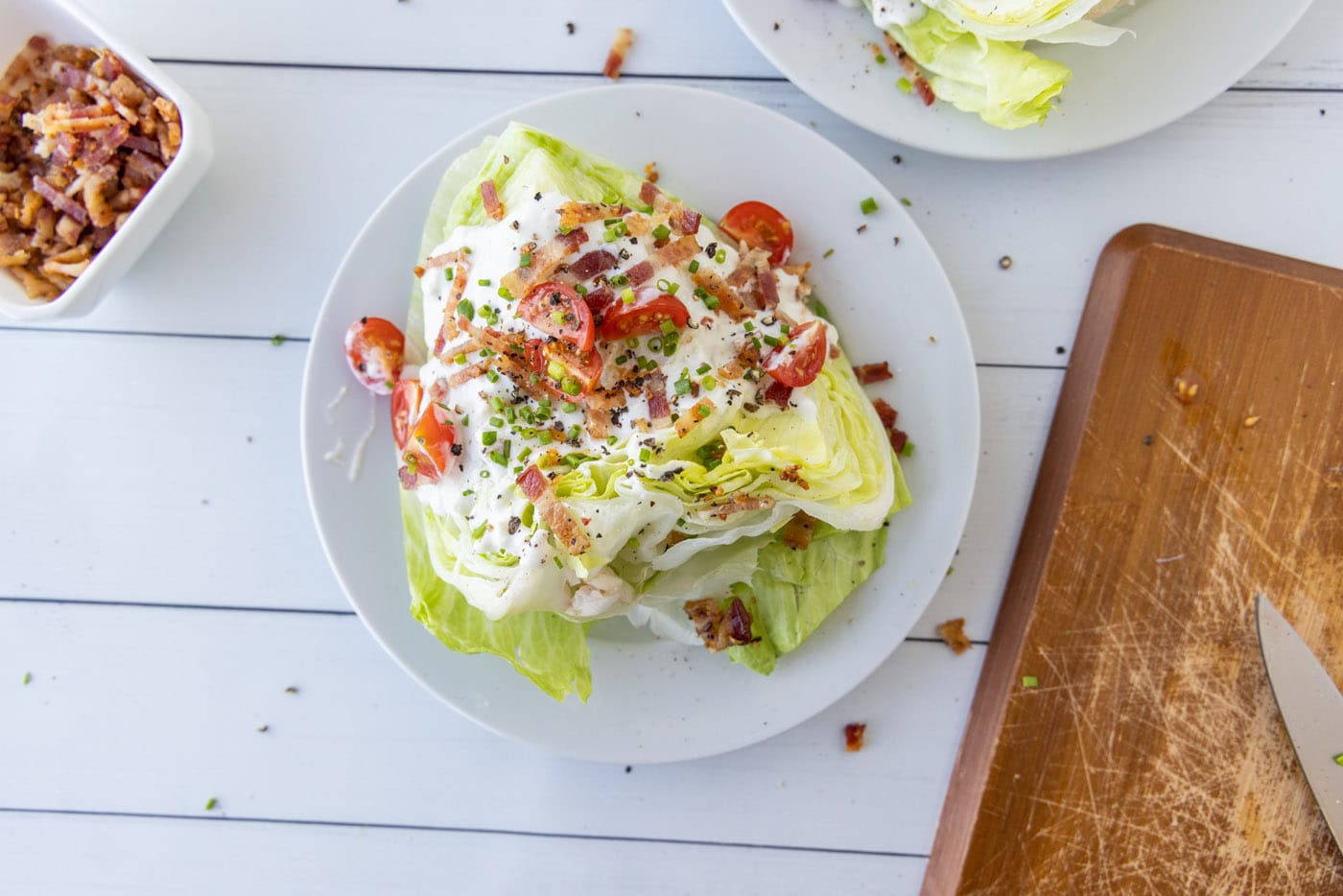 chives and bleu cheese crumbles added to bacon and bleu cheese wedge salad