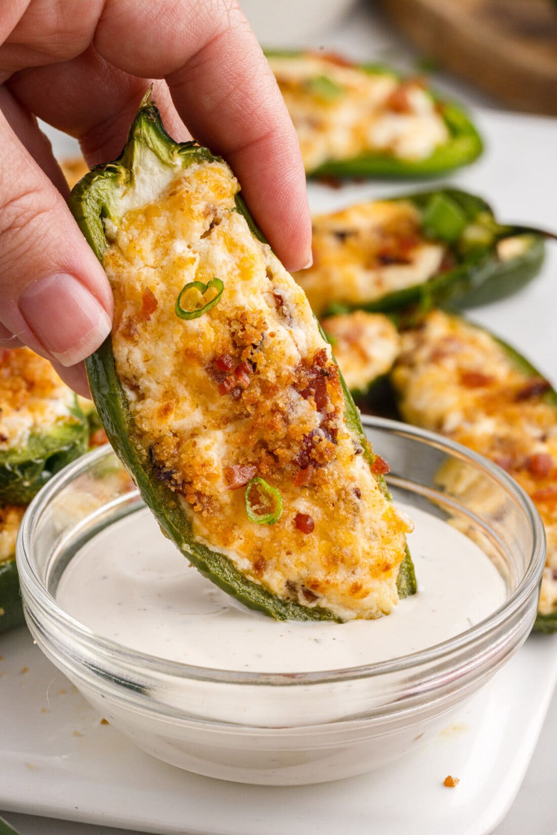 Air Fryer Jalapeno Popper dipped in ranch