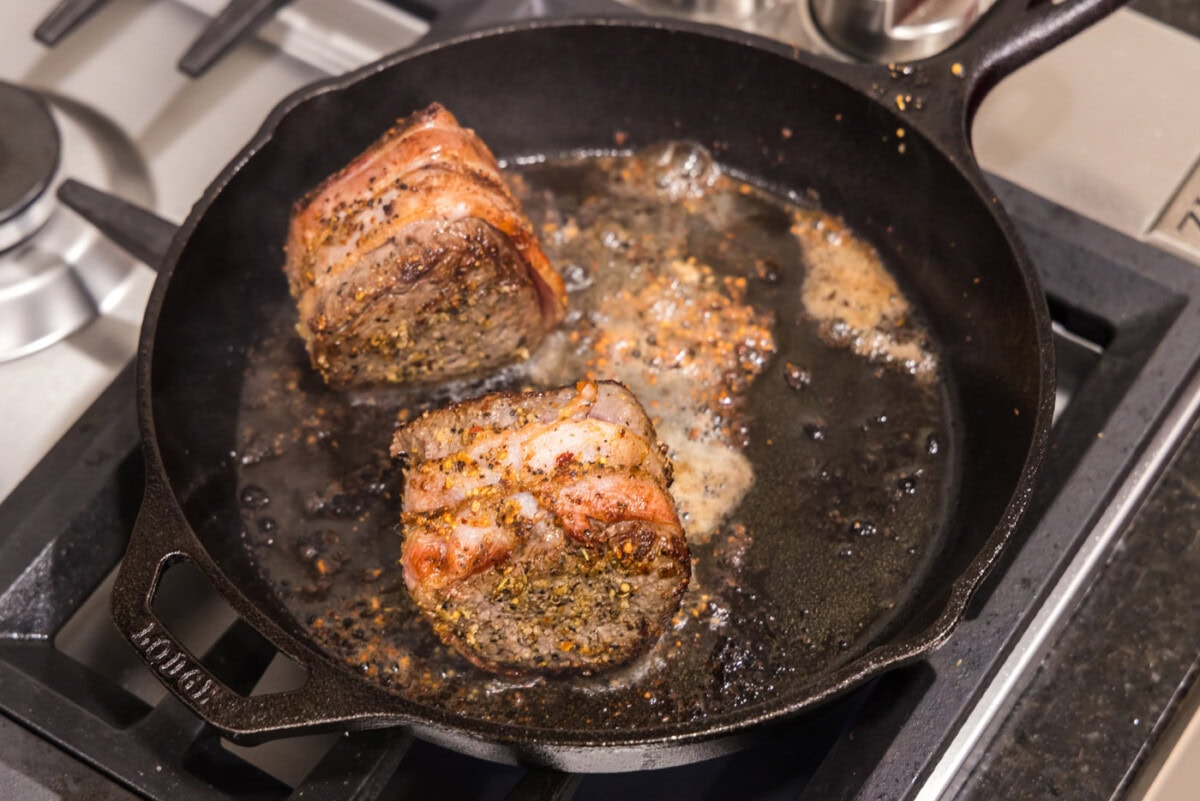 searing bacon wrapped filet mignon