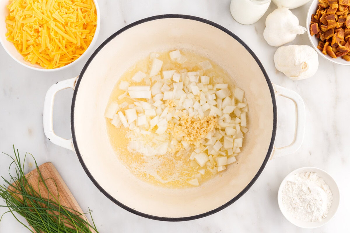 onions and garlic in melted butter