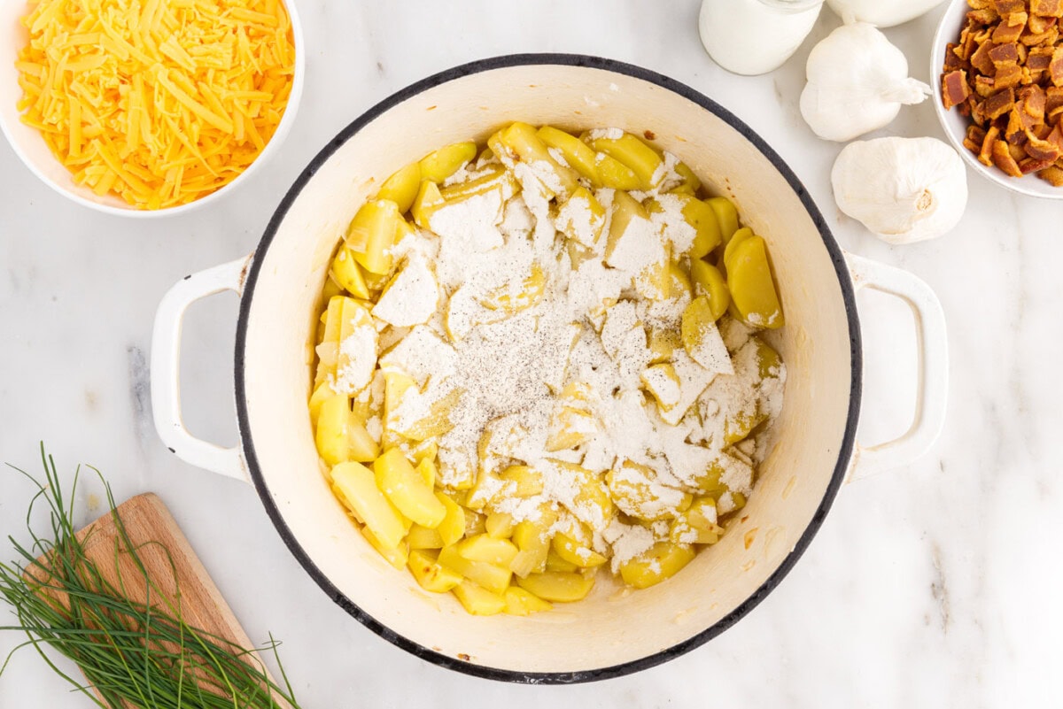 sprinkled flour over diced potatoes