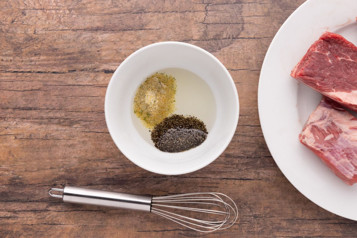 olive oil, salt, and pepper in a bowl