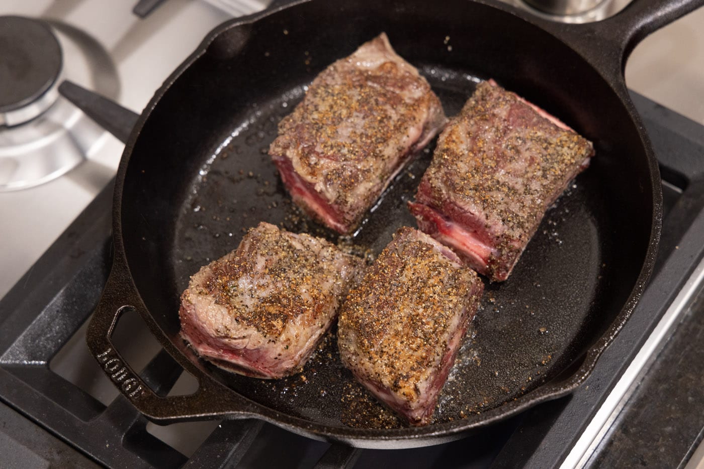 browned beef short ribs in a skillet