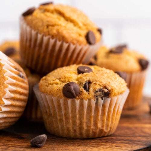 Close up of Chocolate Chip Muffins on a wooden platter