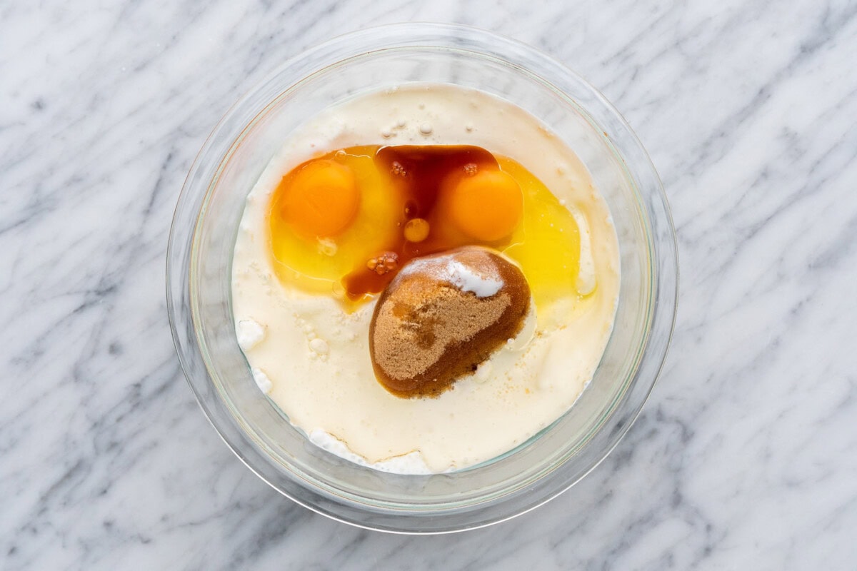 granulated sugar, brown sugar, buttermilk, oil, eggs, and vanilla extract in a bowl