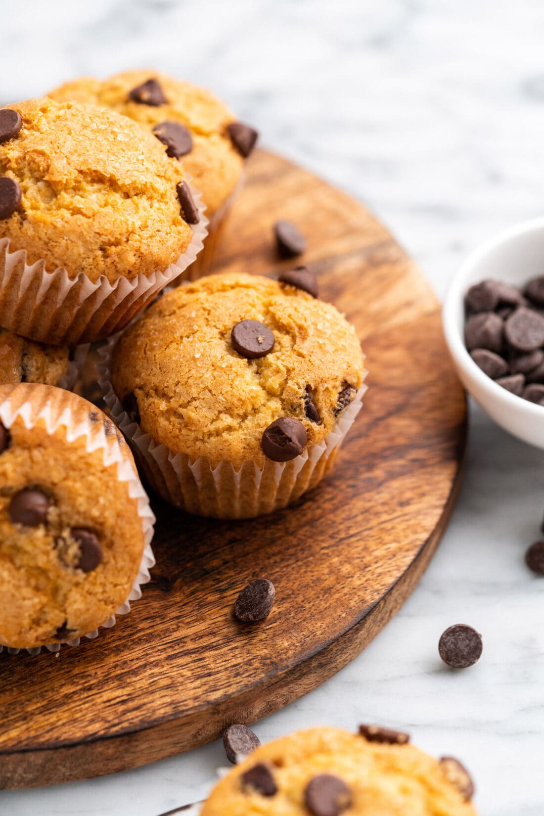 Chocolate Chip Muffins on a wooden platter