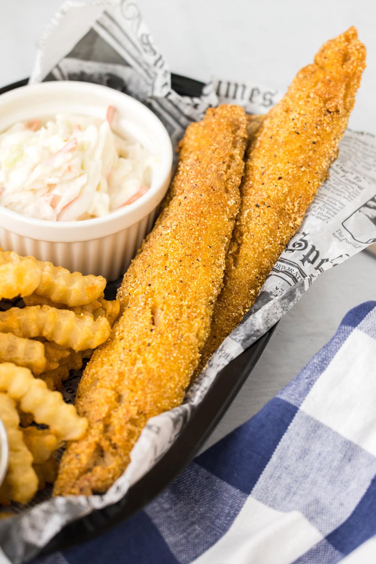 Fried Whiting Fish in a basket with fries