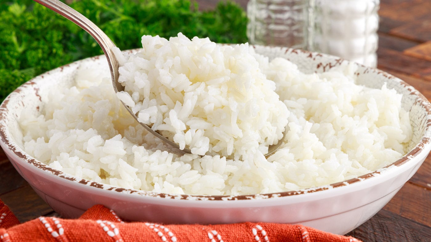 With both methods below, you'll get fluffy, perfectly cooked rice that isn't sticky or burnt to the 
