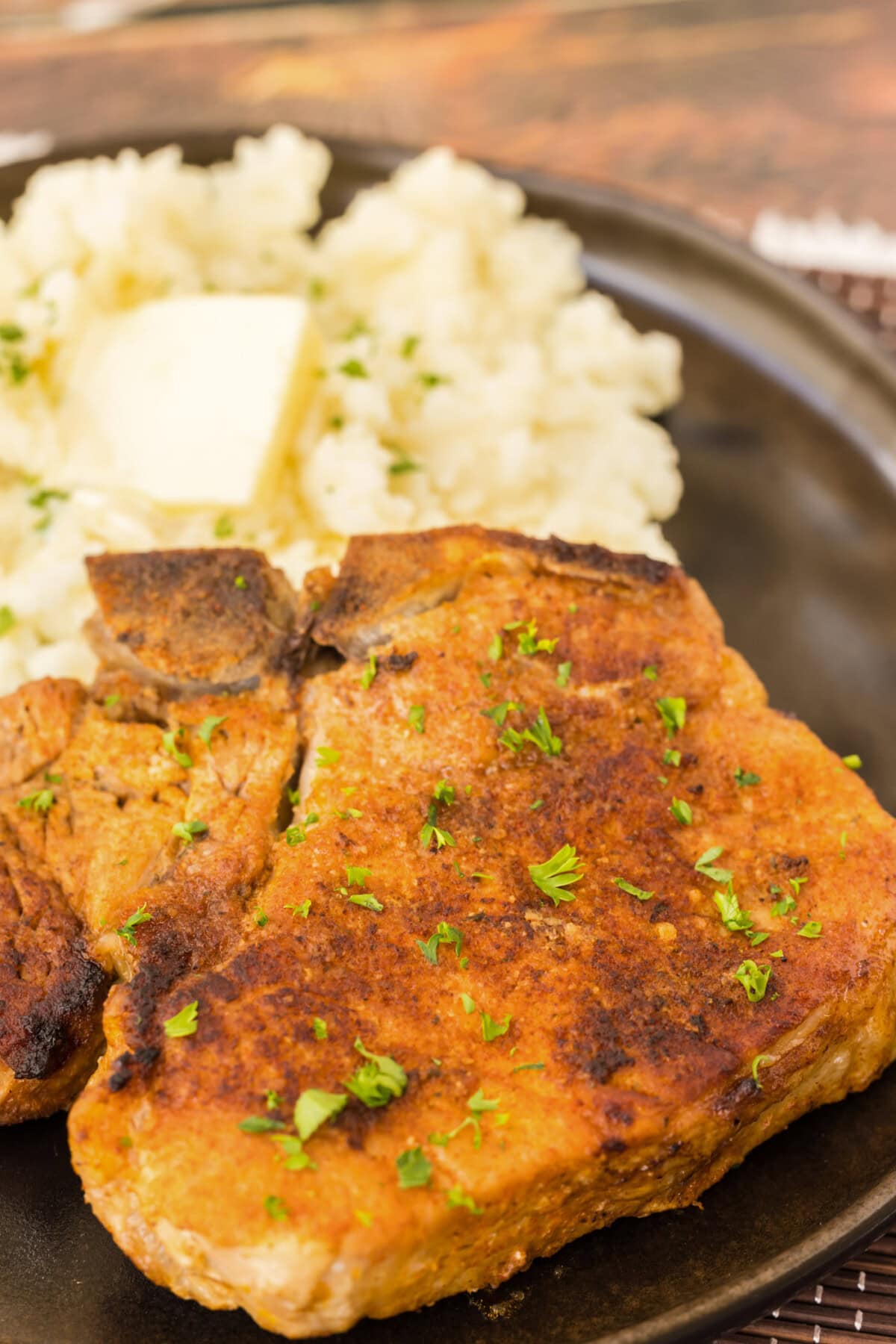 Close up of a Instant Pot Pork Chop on a plate