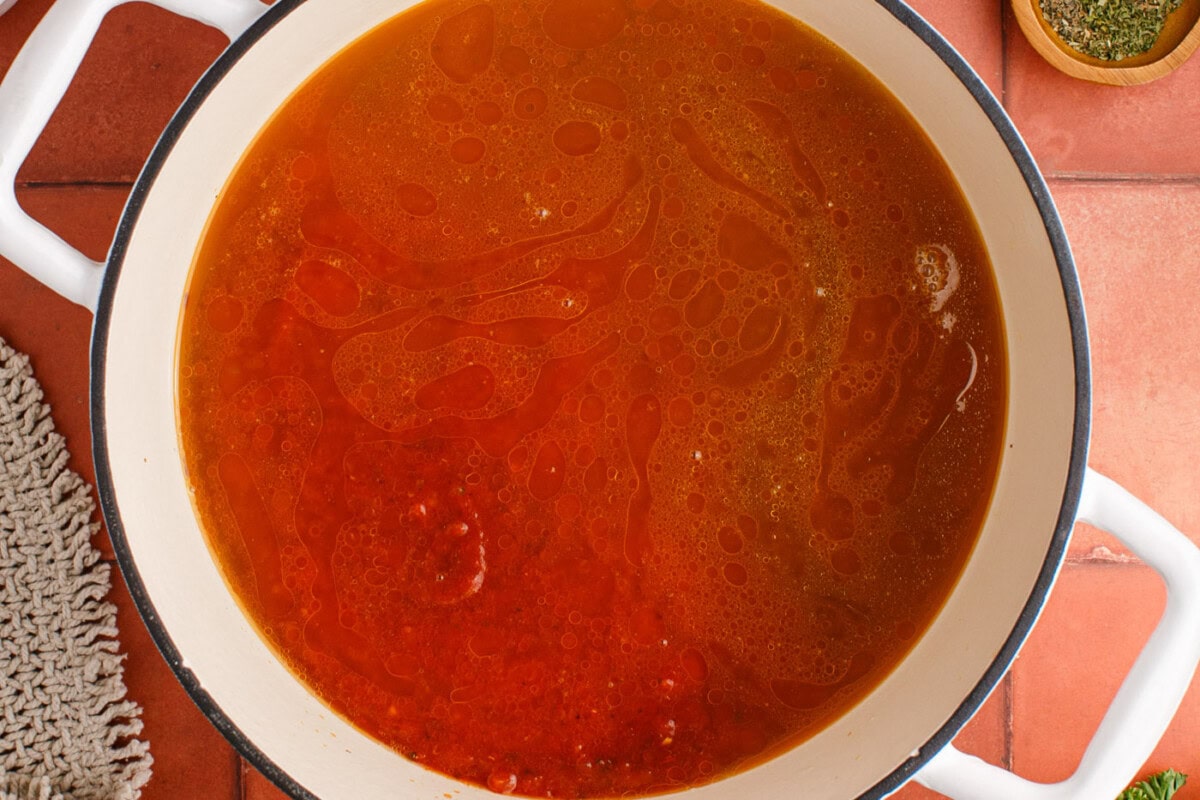 marinara sauce added to ground beef and sausage mixture