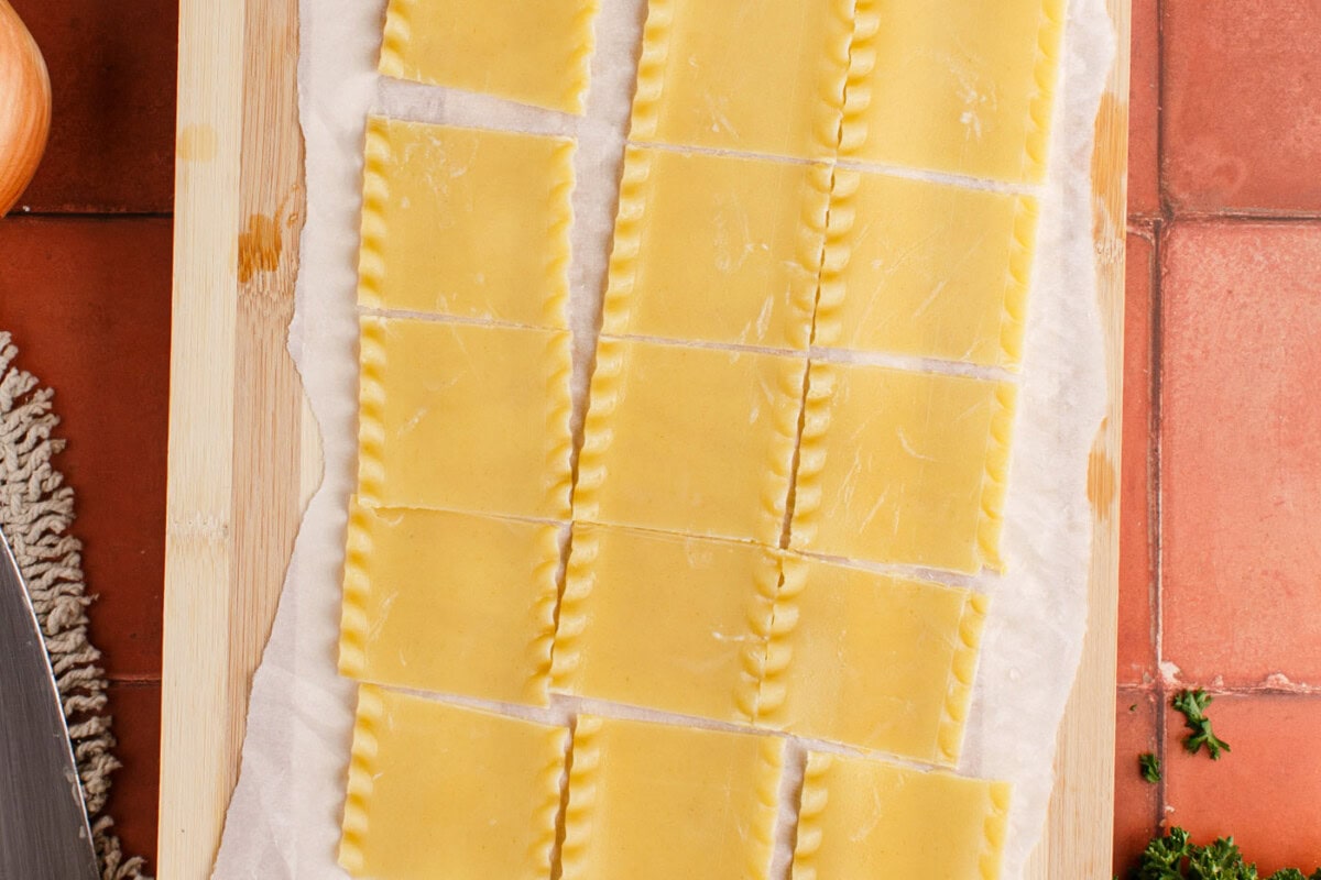 cutting lasagna noodles into small squares