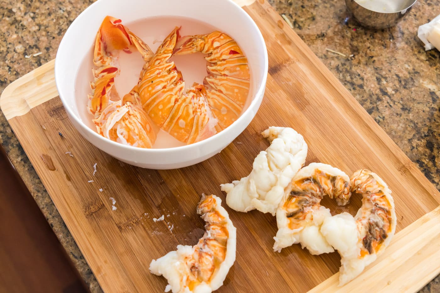removing meat from lobster tails