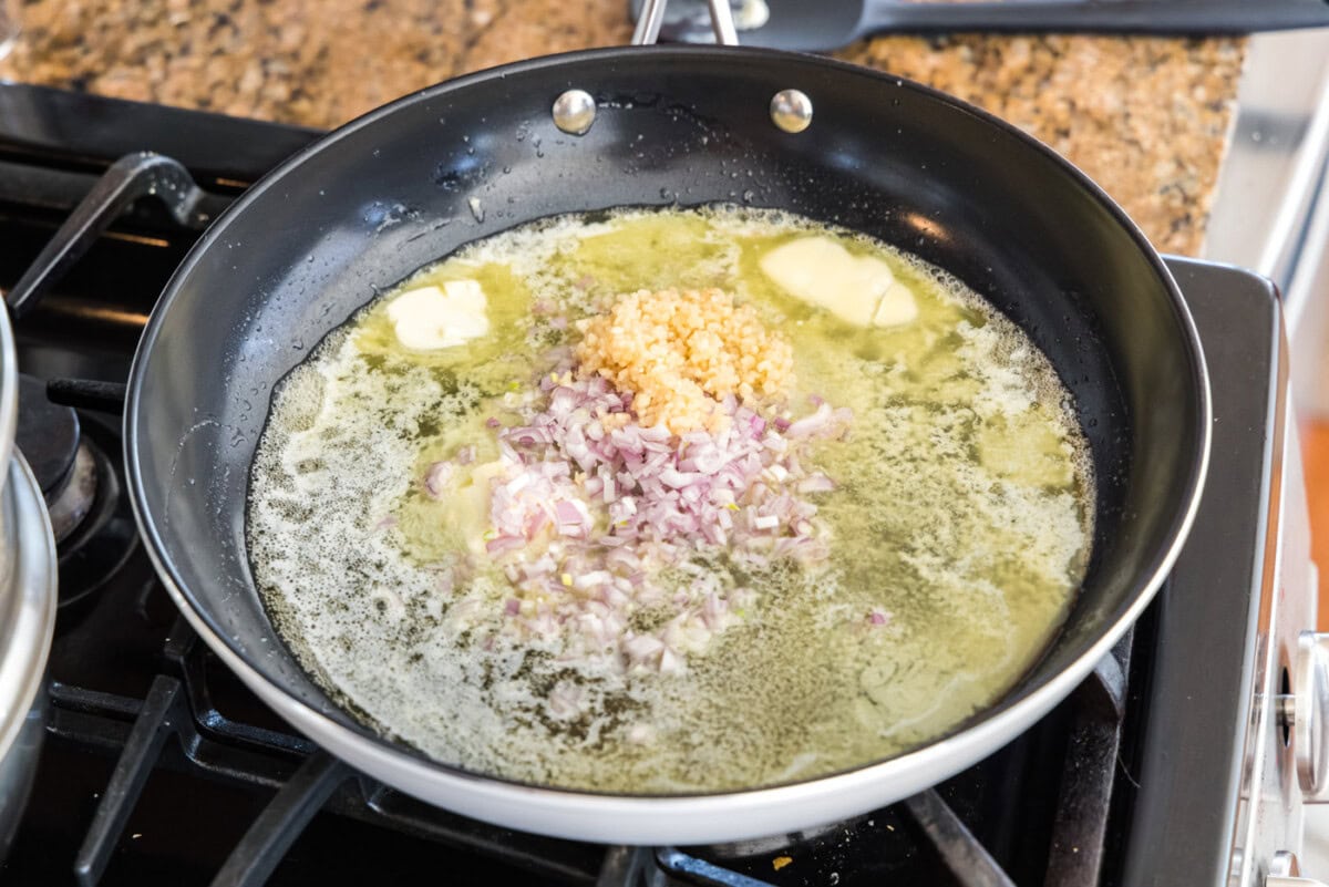 butter, shallots, garlic, lemon juice, and white wine in a skillet