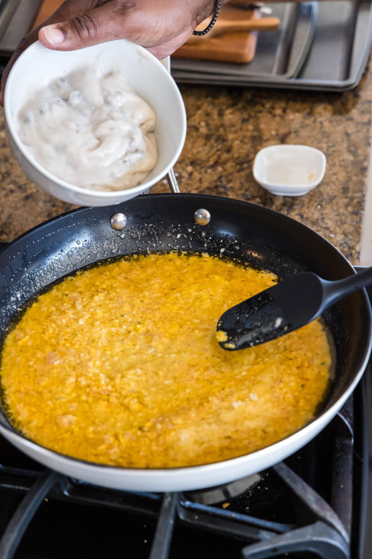 adding cream of mushroom soup to thermidor sauce