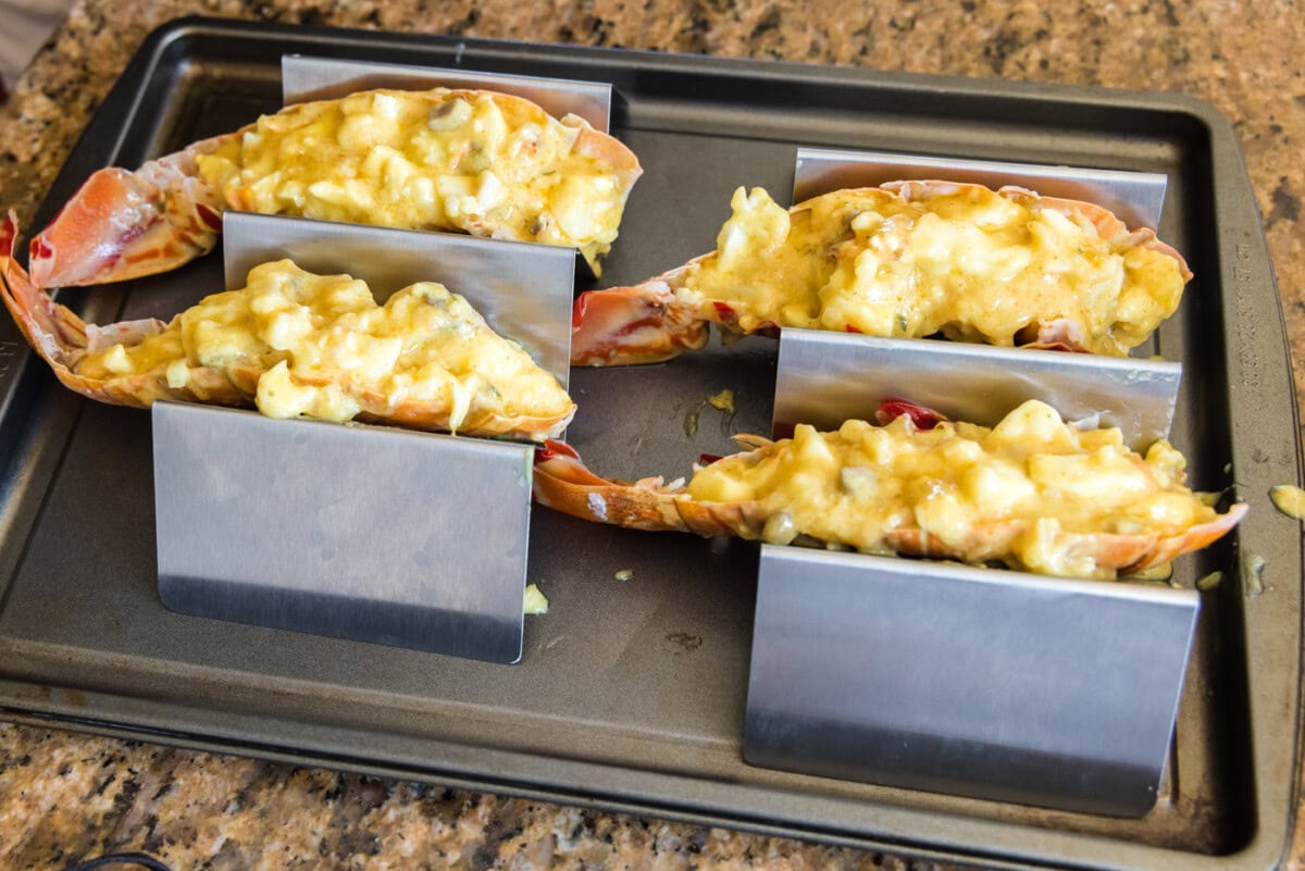 lobster thermidor held in taco holders