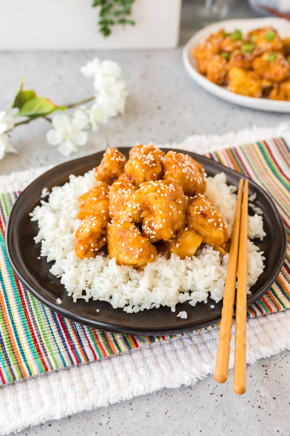 Plate of Orange Chicken over rice