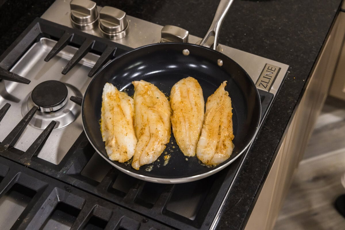 pan seared orange roughy in a skillet