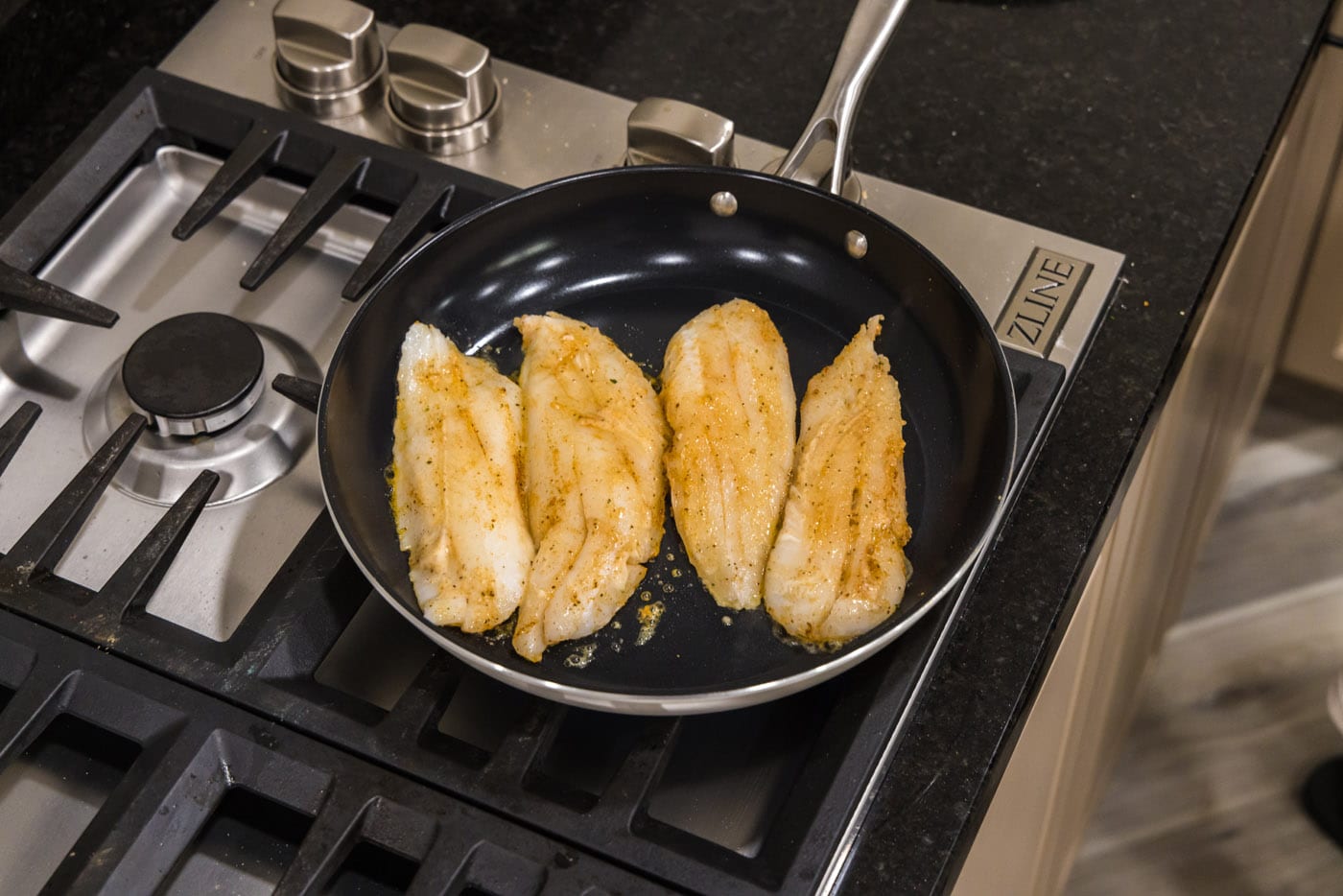 pan seared orange roughy in a skillet