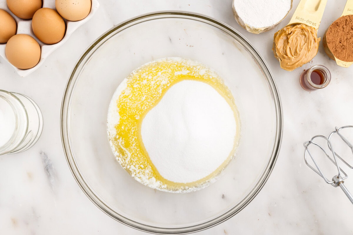 melted butter and sugar in a mixing bowl