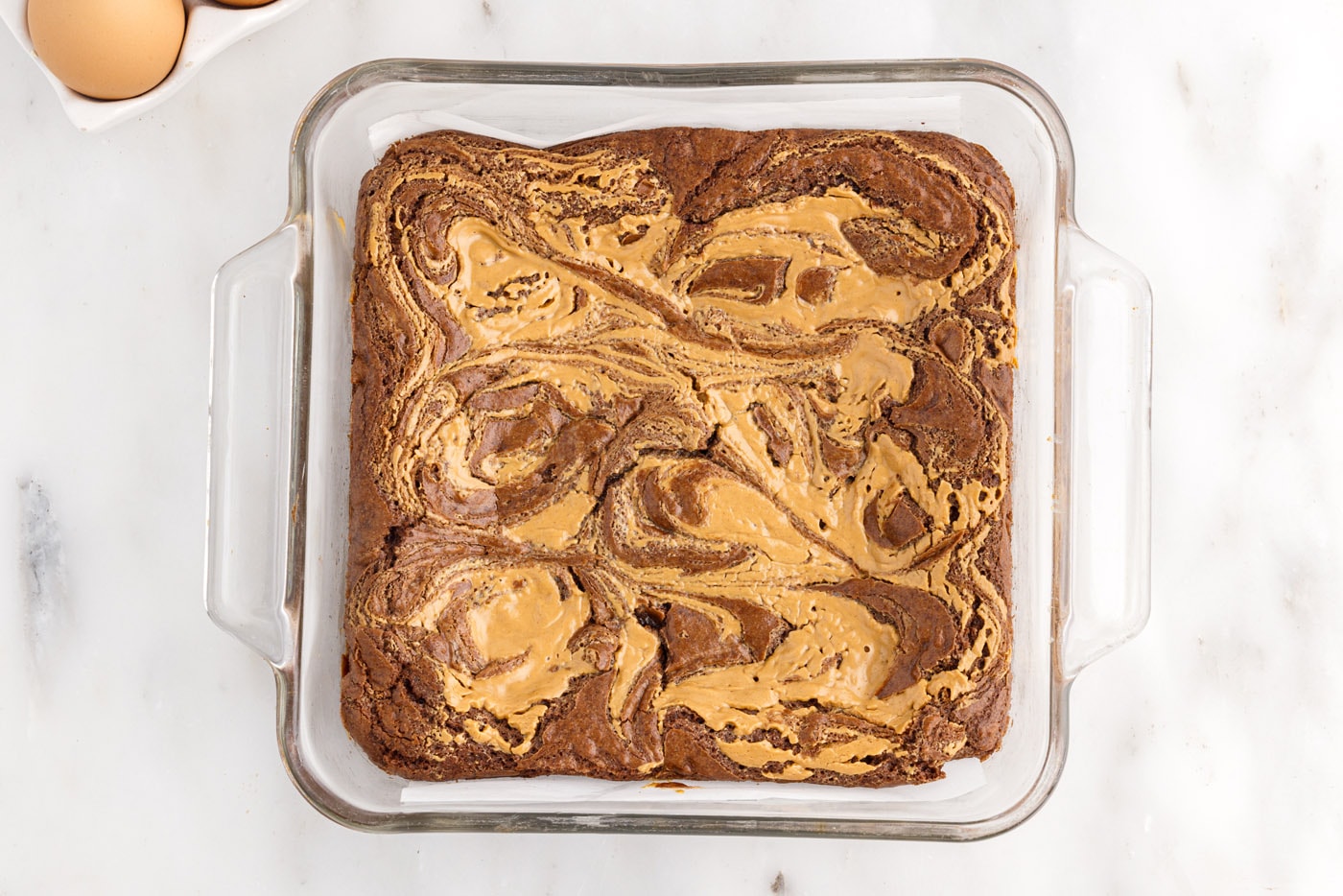 peanut butter brownies baked in a glass pan