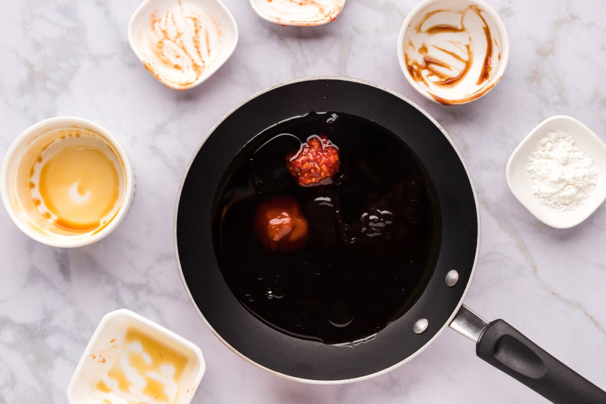 spicy salmon sauce ingredients in a skillet