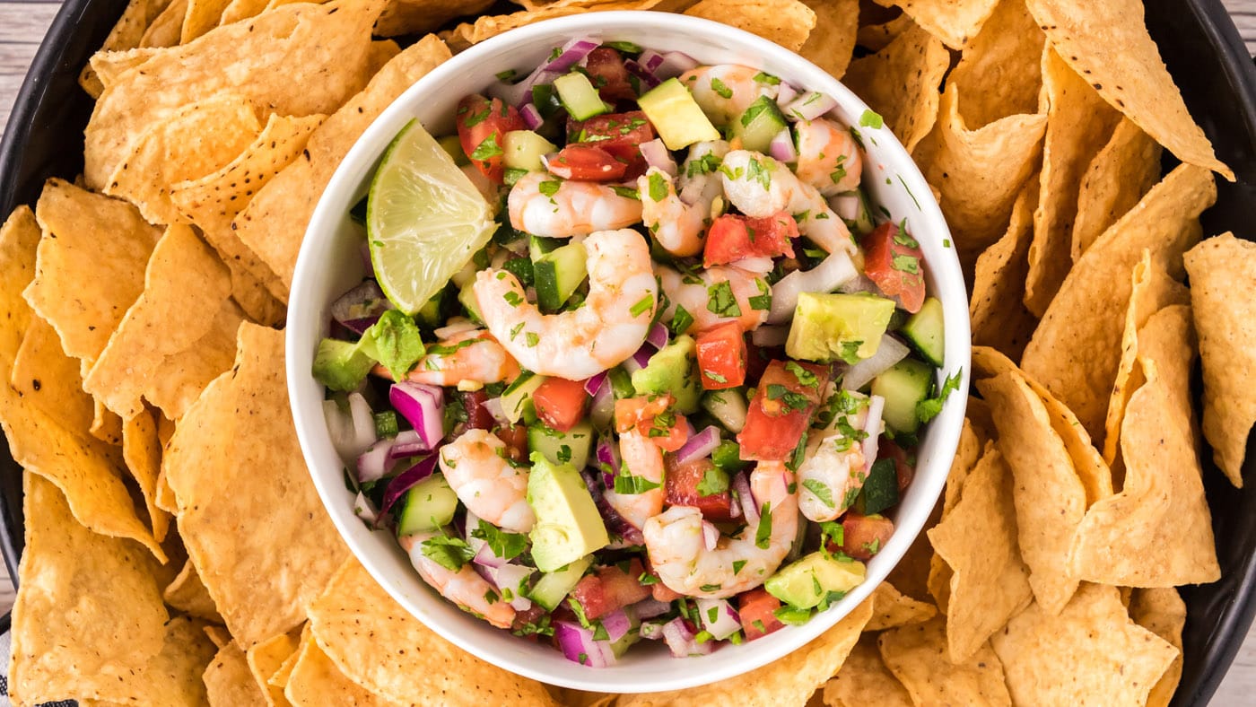 Juicy shrimp tossed with cucumber, tomatoes, red onion, serrano peppers, avocado, and cilantro makes
