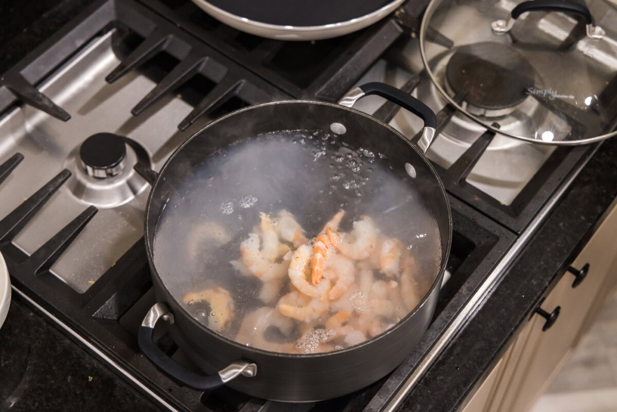 poaching shrimp in a pot
