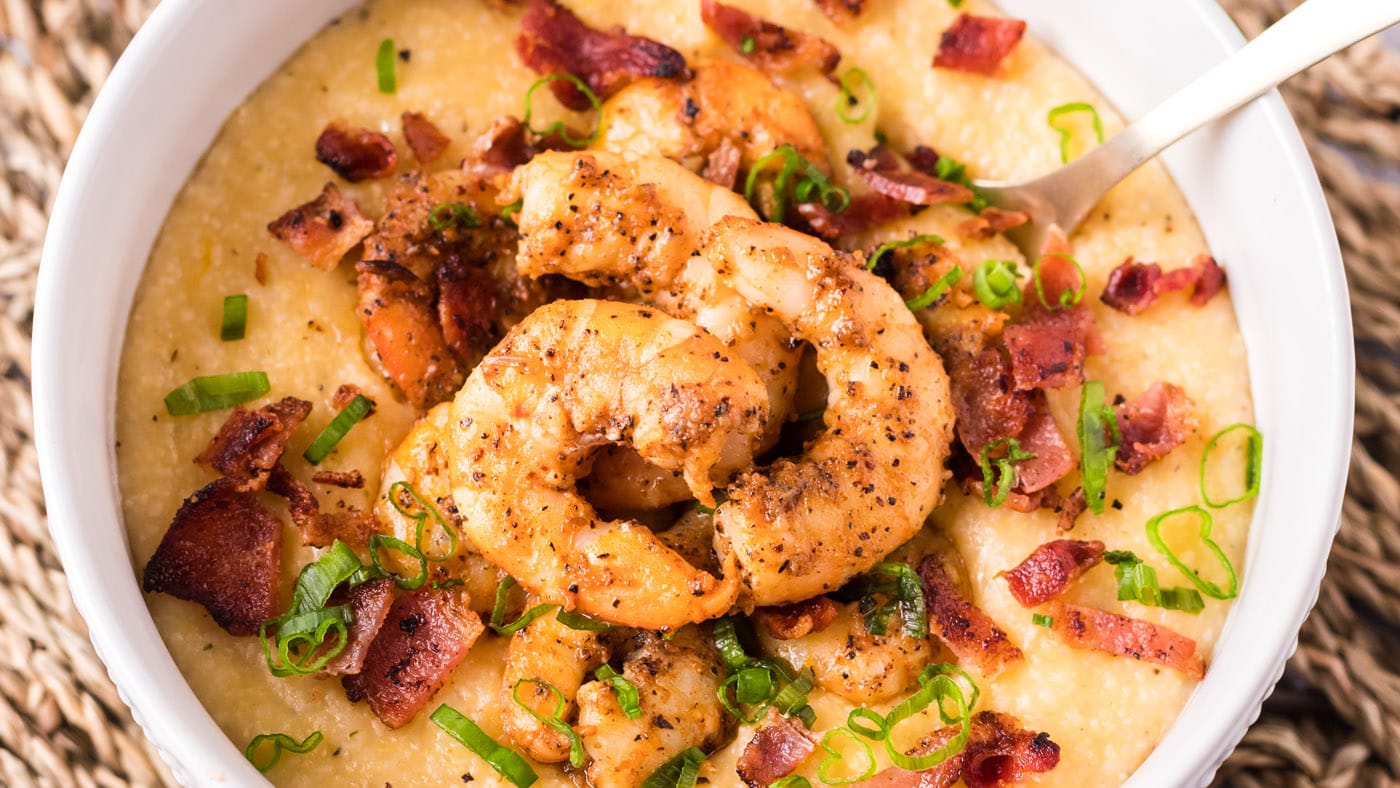 Plump shrimp are met with a simple yet flavorful Cajun seasoning and then cooked in bacon grease wit