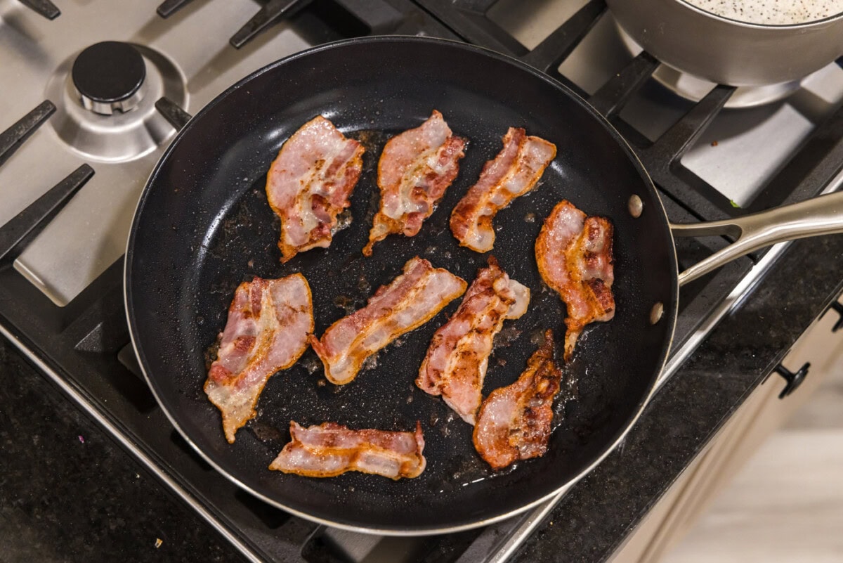 bacon cooking in a skillet