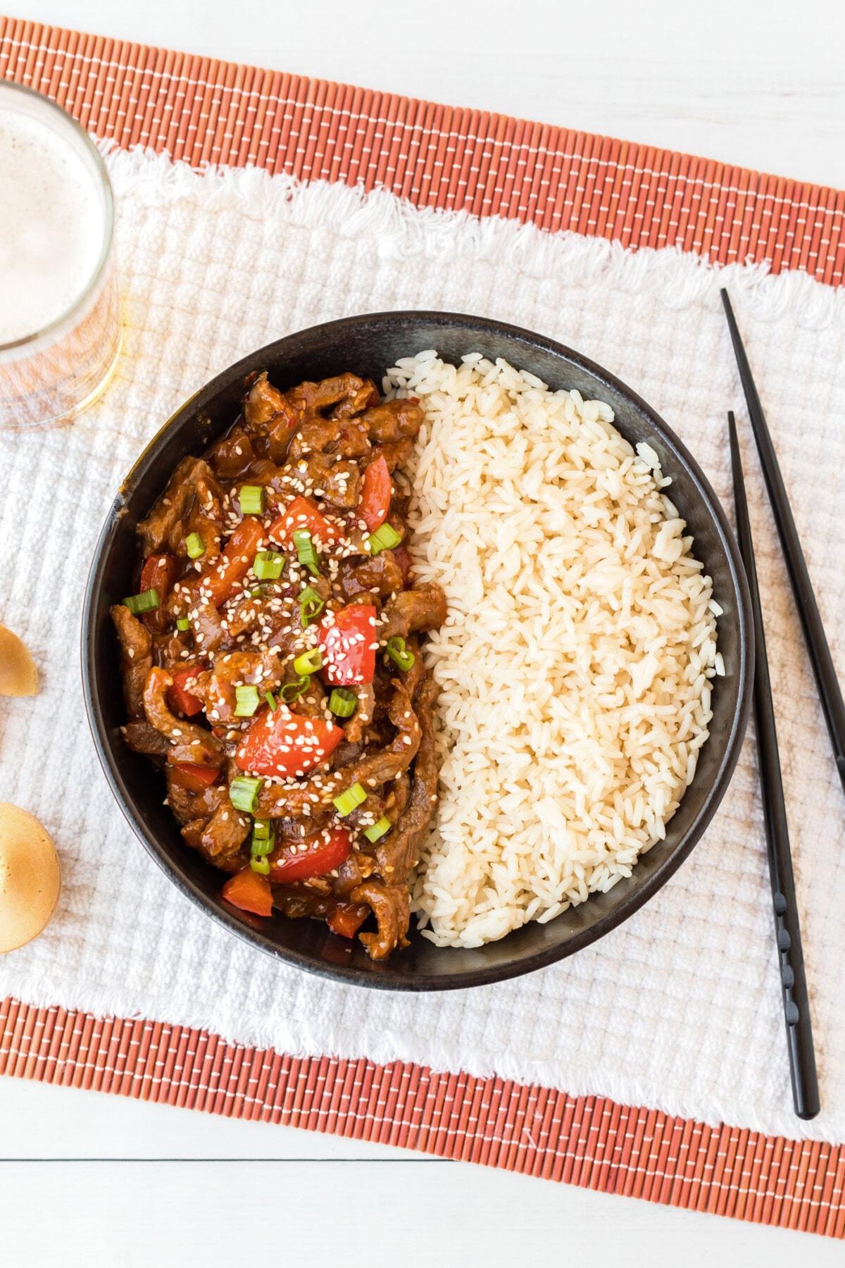 Overhead photo of Beijing Beef in a bowl with rice