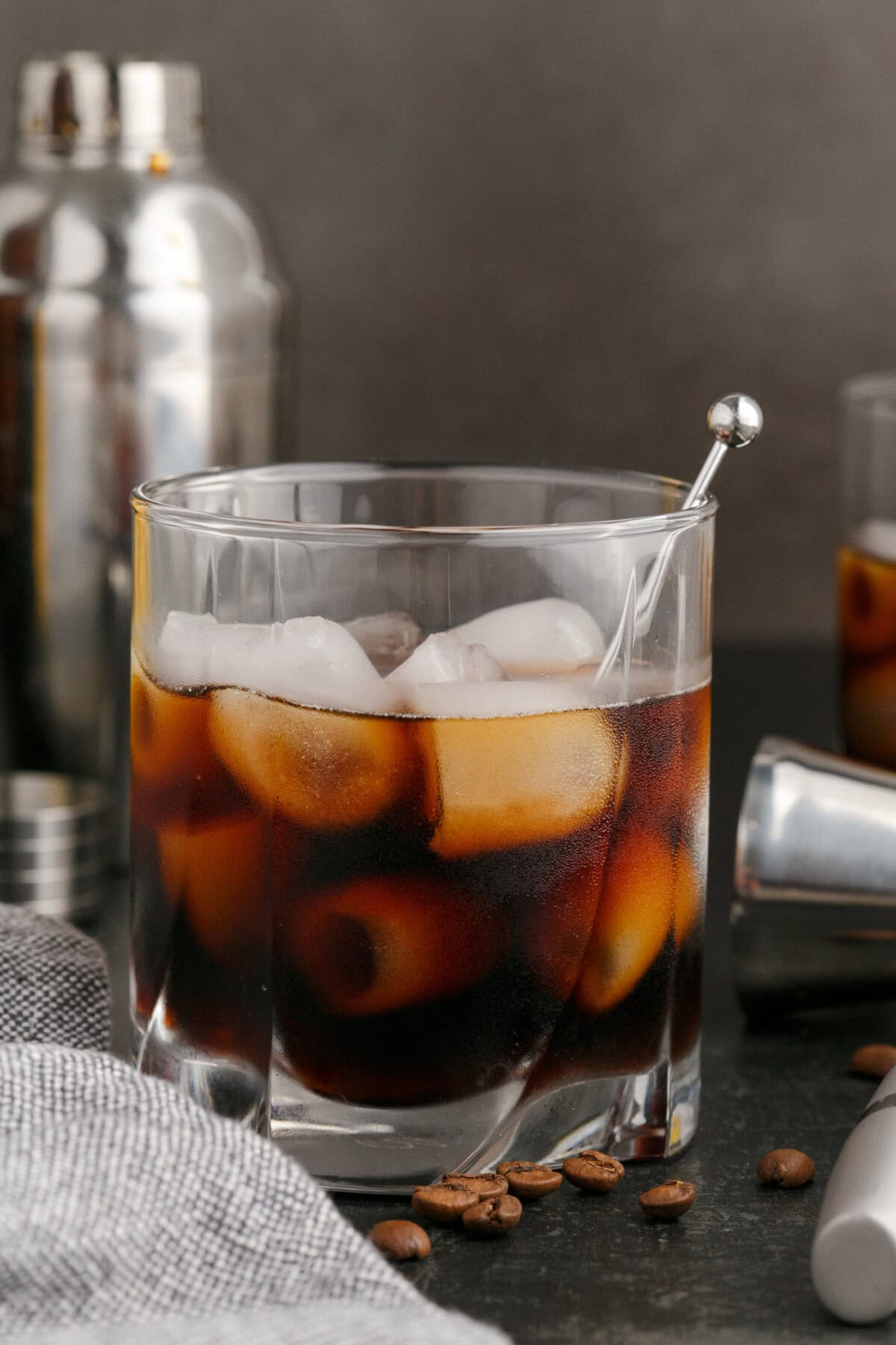 Black Russian with a shaker in the in the background