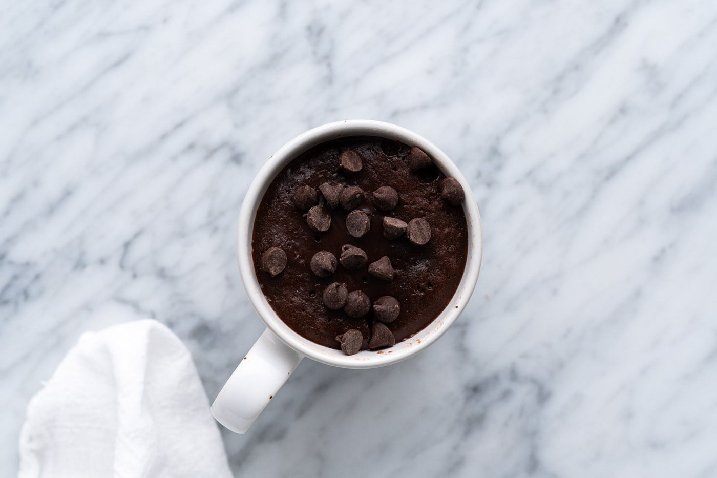 brownie in a mug with chocolate chips
