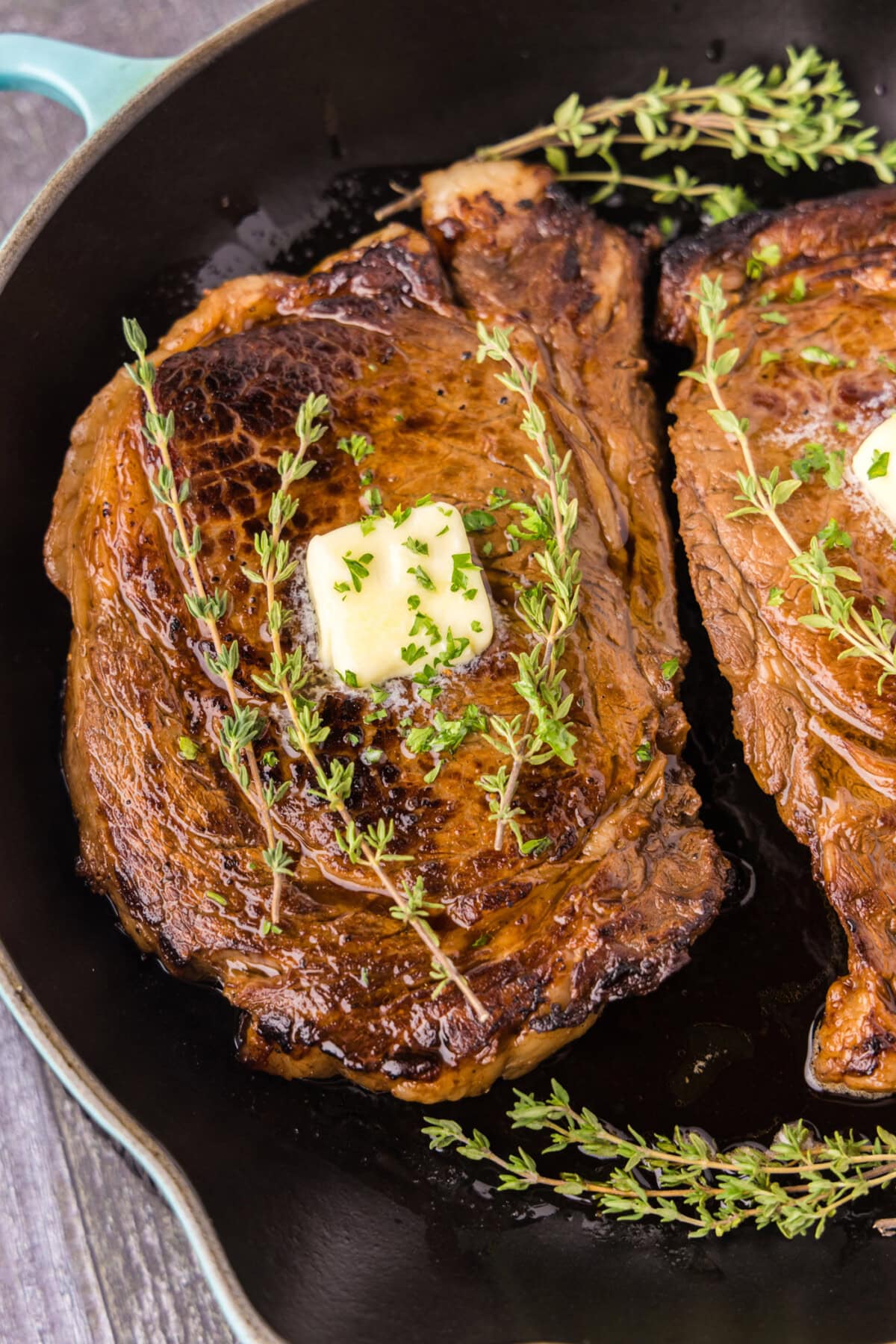 Close up of a Cast Iron Ribeye in a cast iron pan