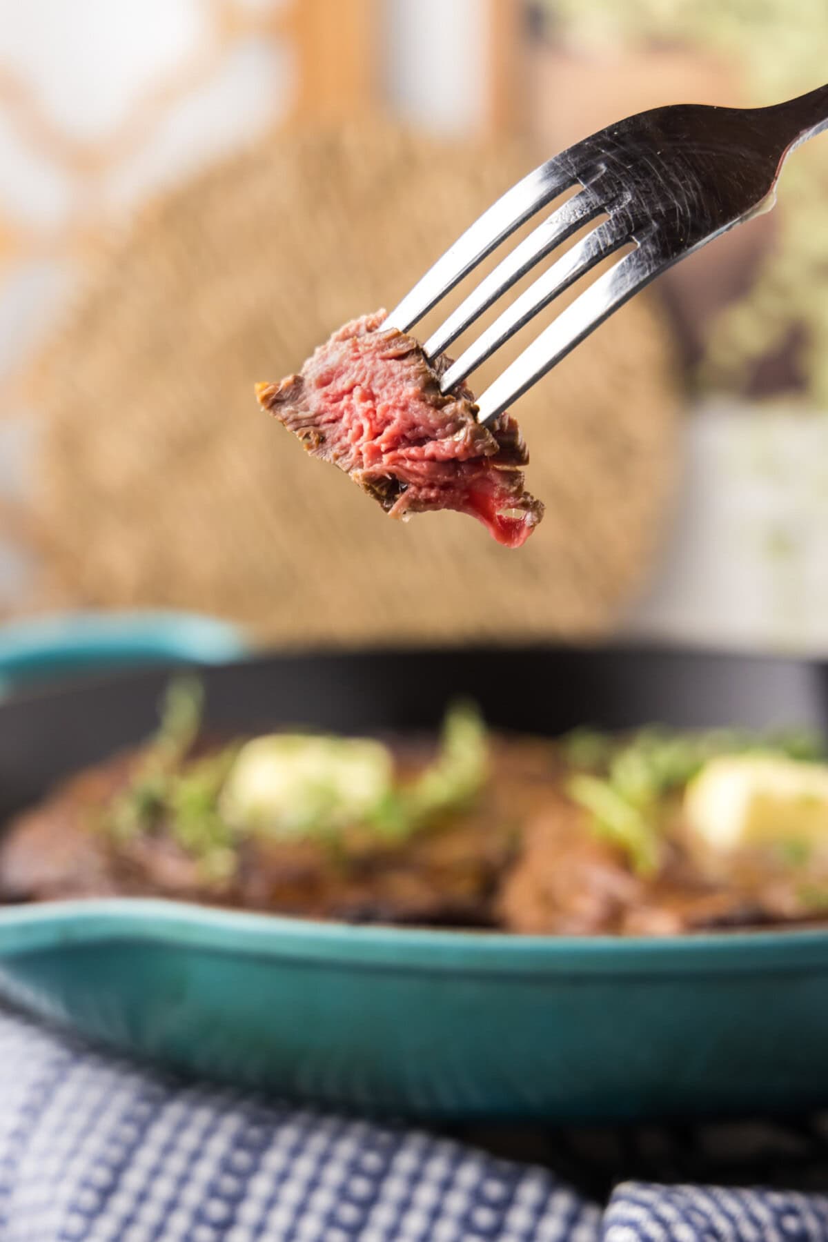 Piece of Cast Iron Ribeye on a fork