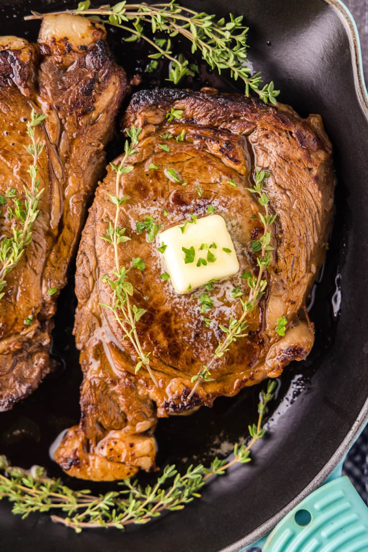 Ribeye Steak Marinade - steak cooked in cast iron pan