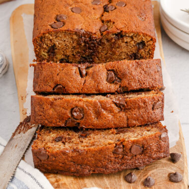 Close up of a loaf of Chocolate Chip Banana Bread cut in slices