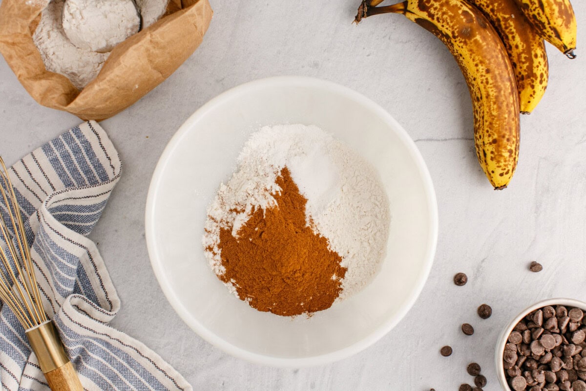 cinnamon, flour, baking soda, baking powder, and salt in a bowl
