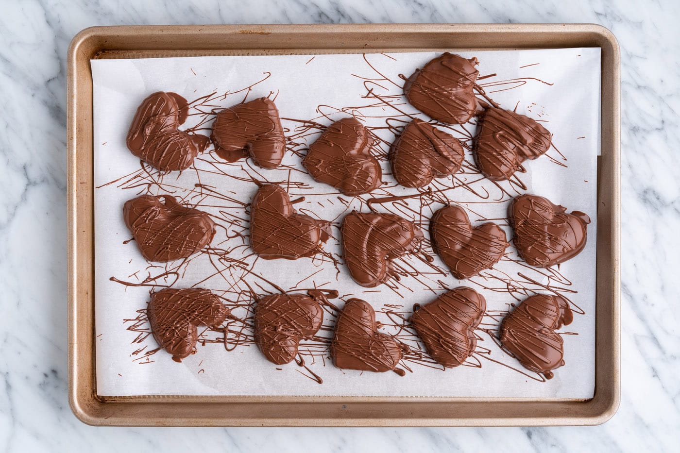 chocolate peanut butter hearts drizzled with extra chocolate