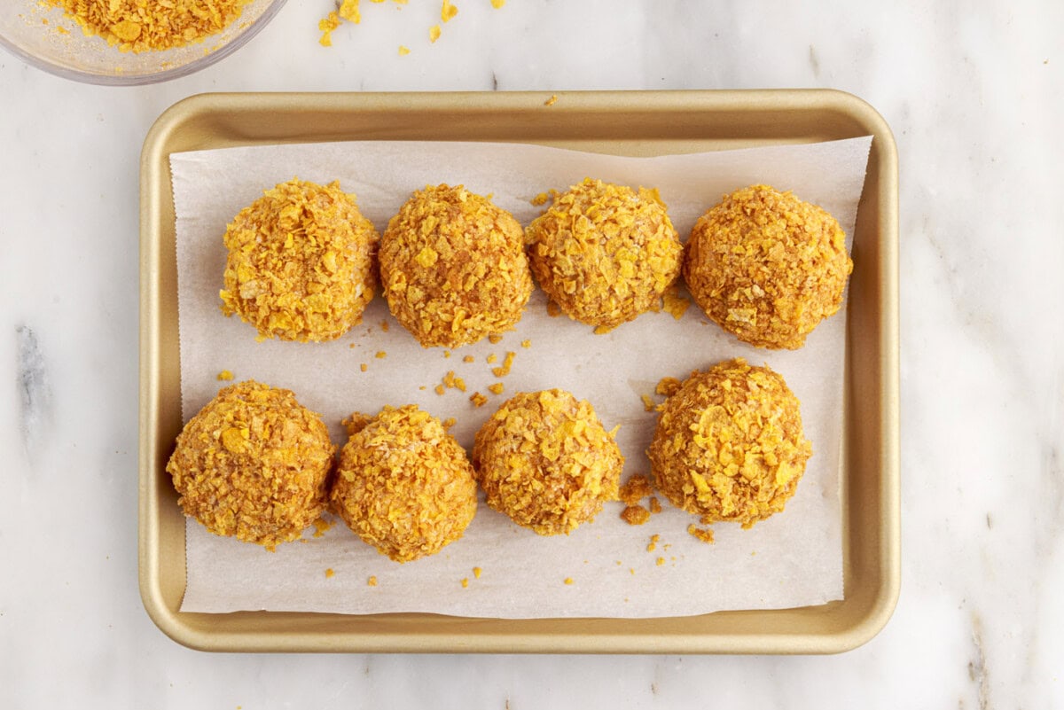 fried ice cream balls on a baking sheet