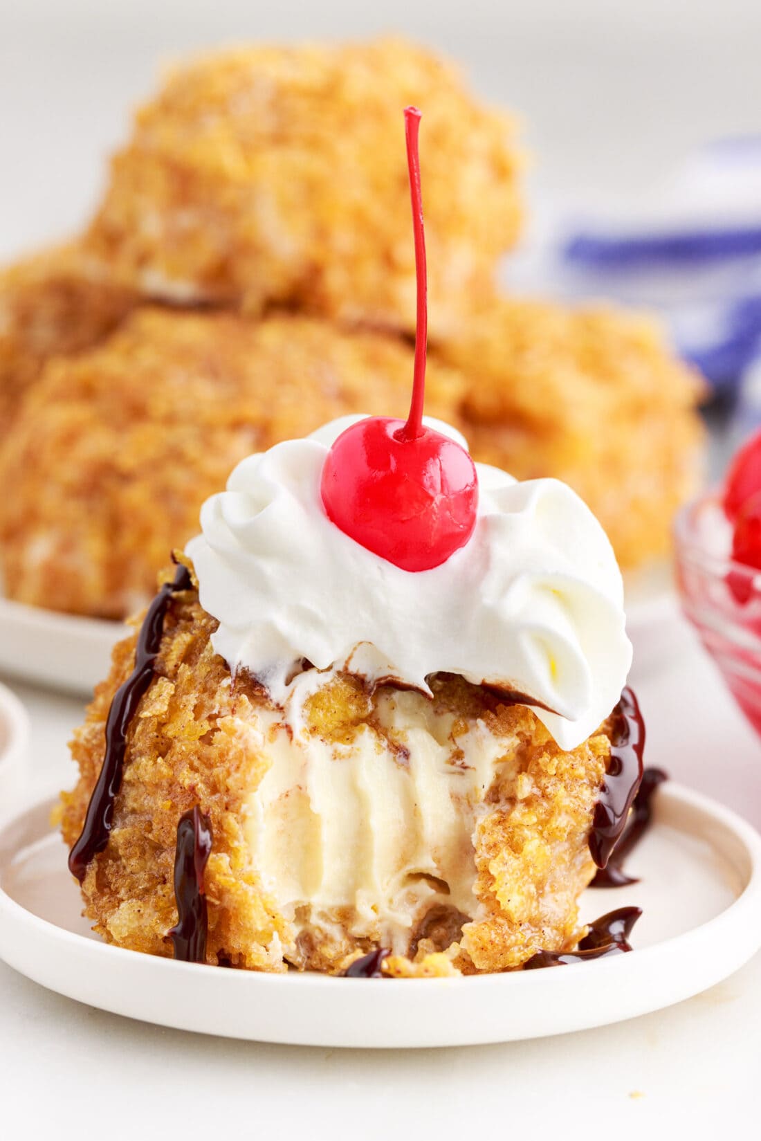 Fried Ice Cream on a plate with a bite taken out