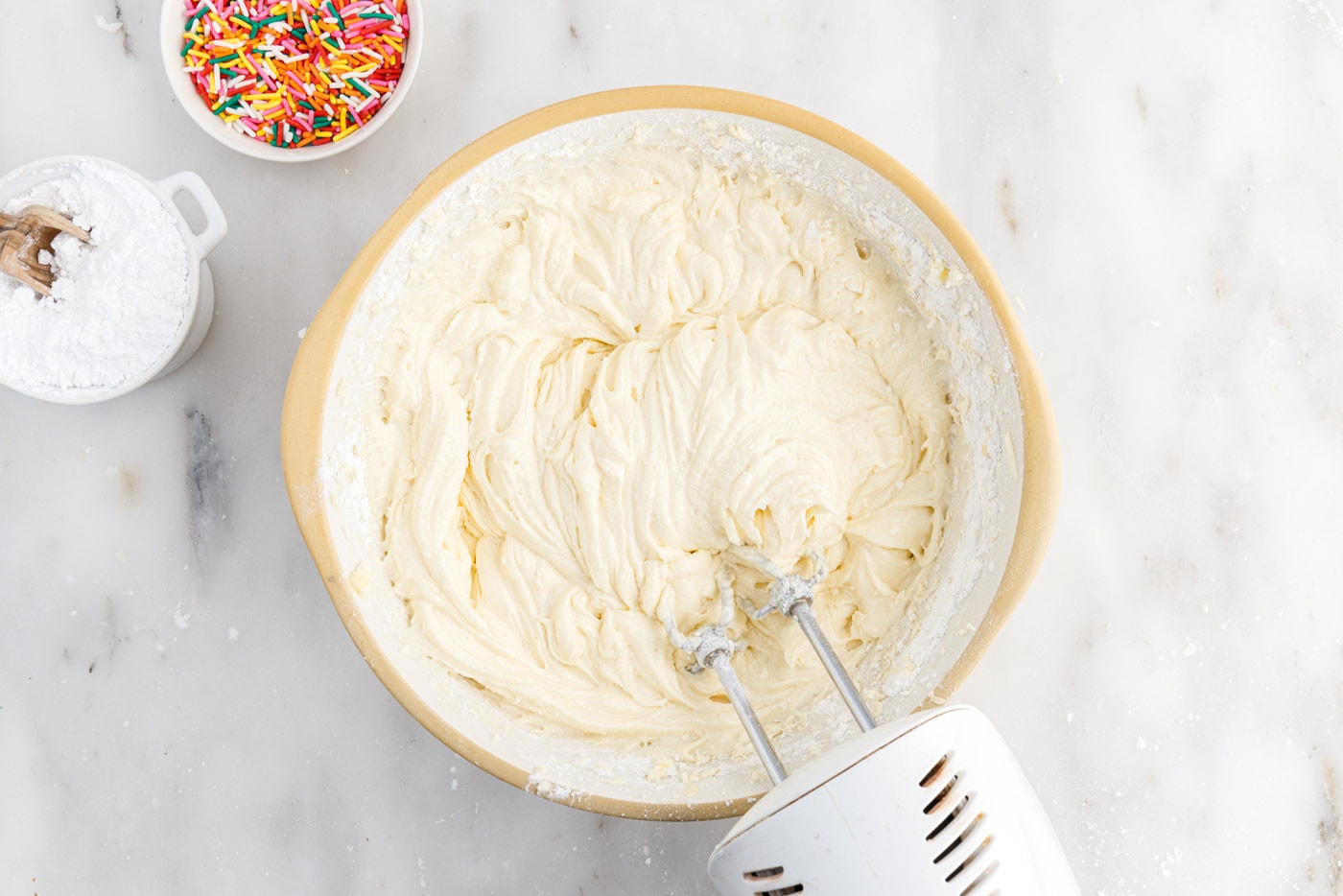 beating cake batter with a hand mixer