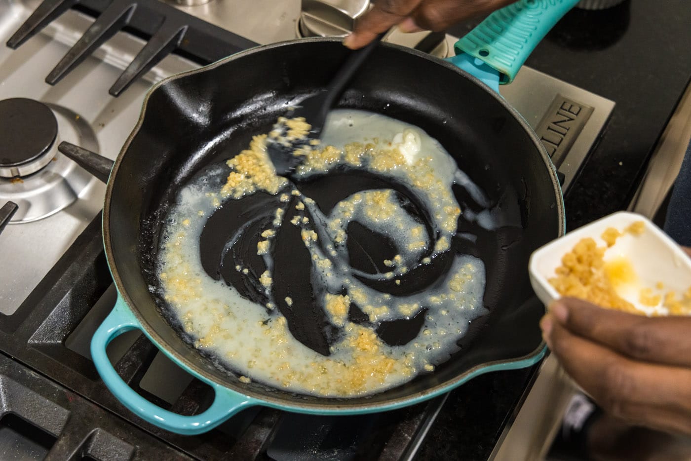 melted butte with garlic in a skillet