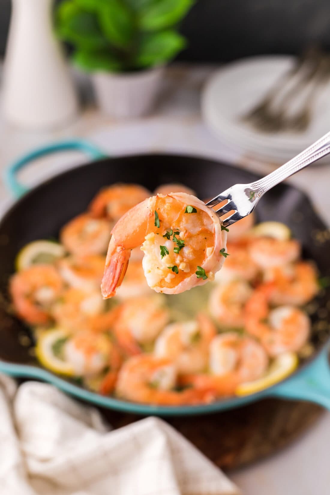 Garlic Butter Shrimp on a seafood fork 